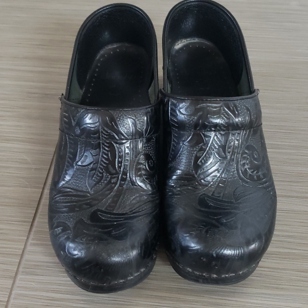 Dansko black embossed clogs